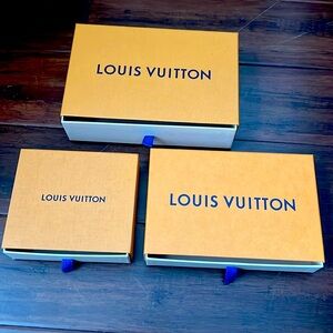 Louis Vuitton boxes (3 count) in different sizes.